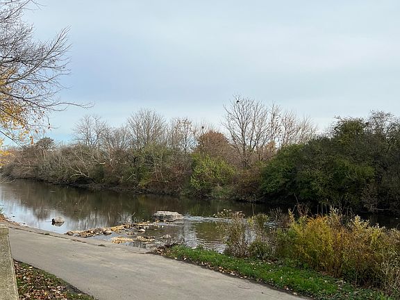 DuPage River next to complex