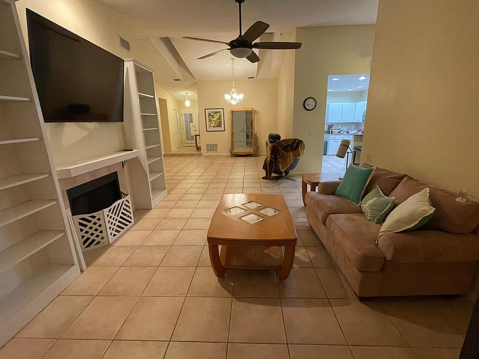 Great room looking toward the entrance on the left and kitchen on the right