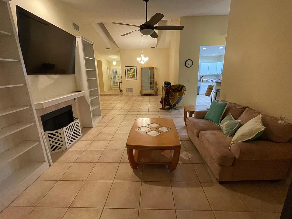 Great room looking toward the entrance on the left and kitchen on the right