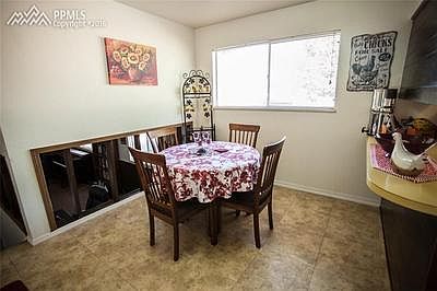Lovely dining area with tile floor.