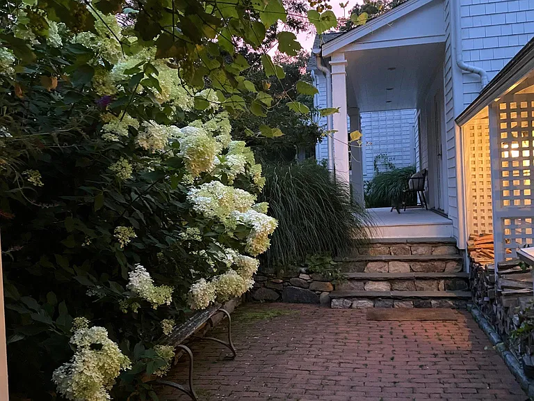 back entrance from driveway (main entrance to mud room and back staircase)