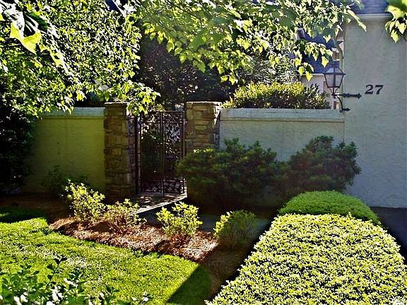 Private Entry Into Courtyard with Fountain