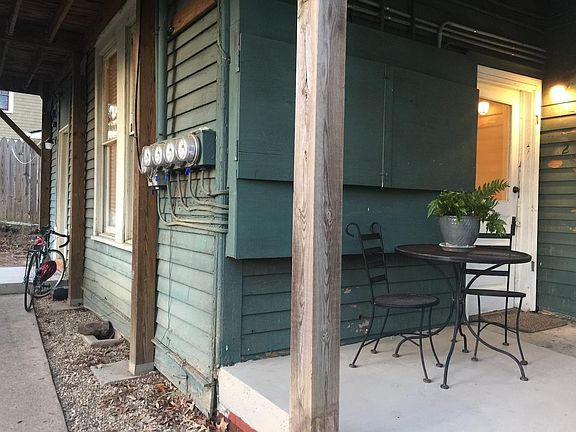 View to kitchen door on left and front door on right