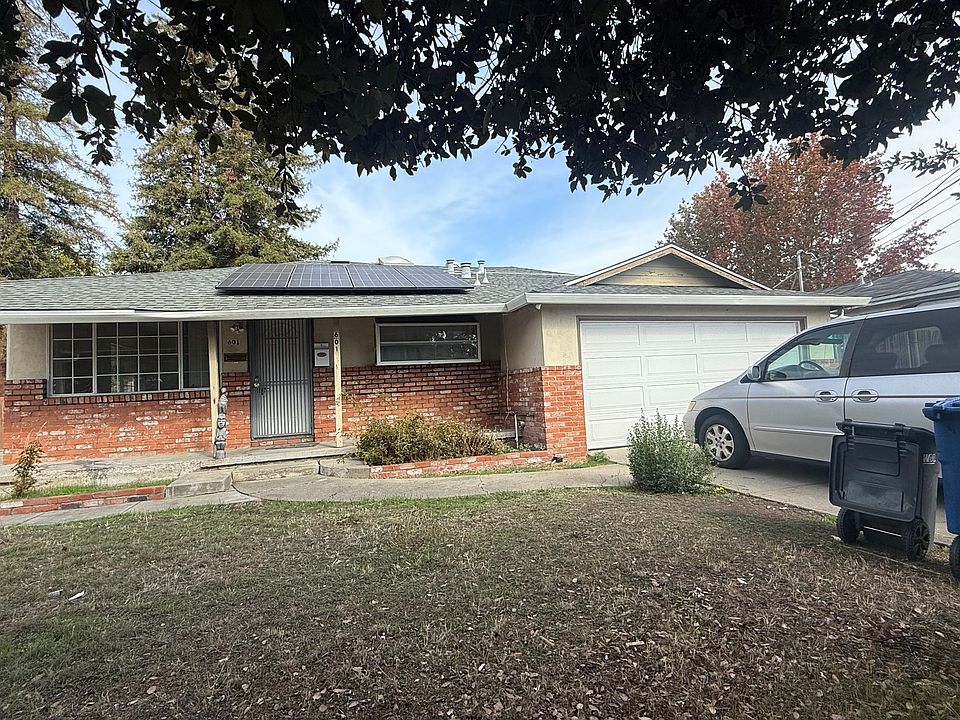 Front of the house with drive way parking