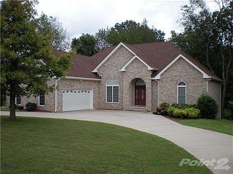 Beautilful all-brick home on approx. 2 acre corner lot in the country.