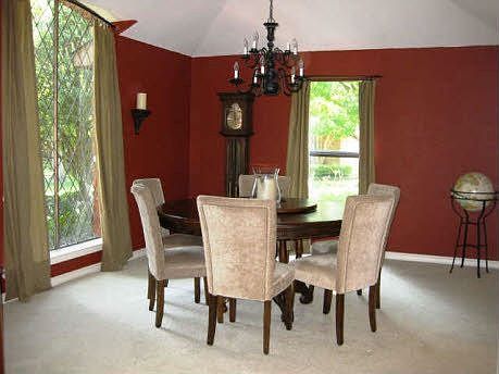 Dining room with vaulted ceiling and stain glass windows