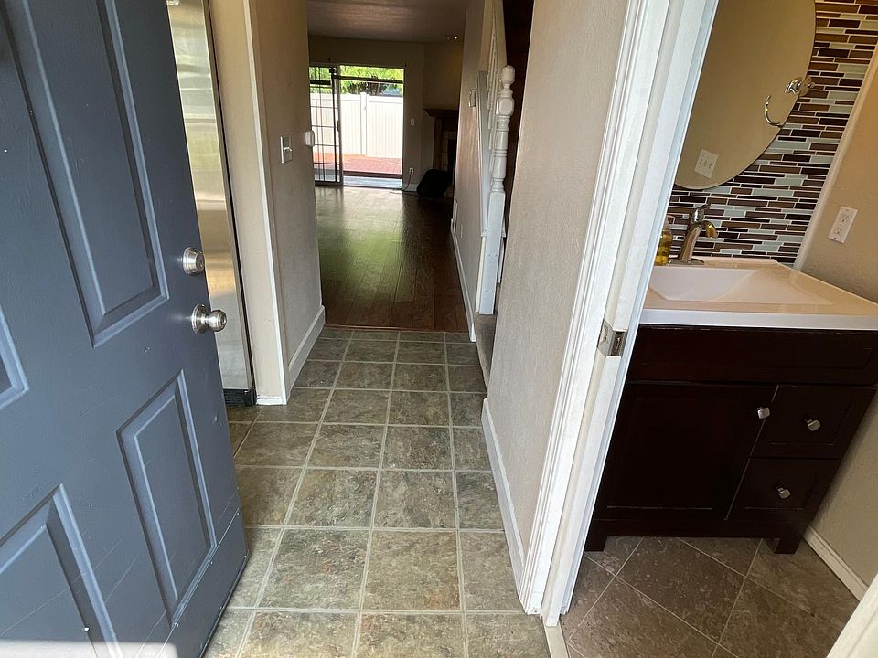 Airy entry with designer powder room
