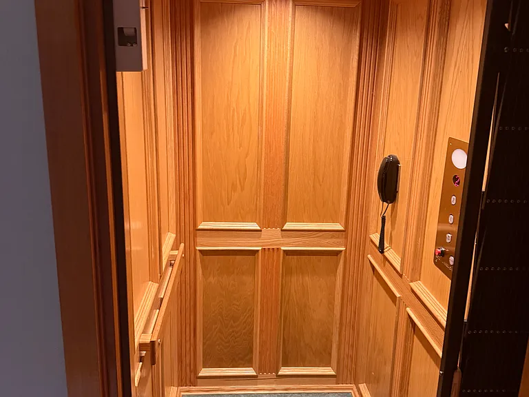 Residential-certified private elevator serving all levels of the estate for ultimate convenience."