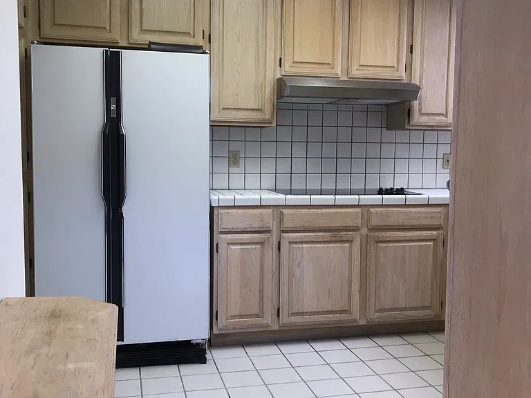 Kitchen. Refrigrator was replaced few months ago with brand new one. Pic shows old frig.