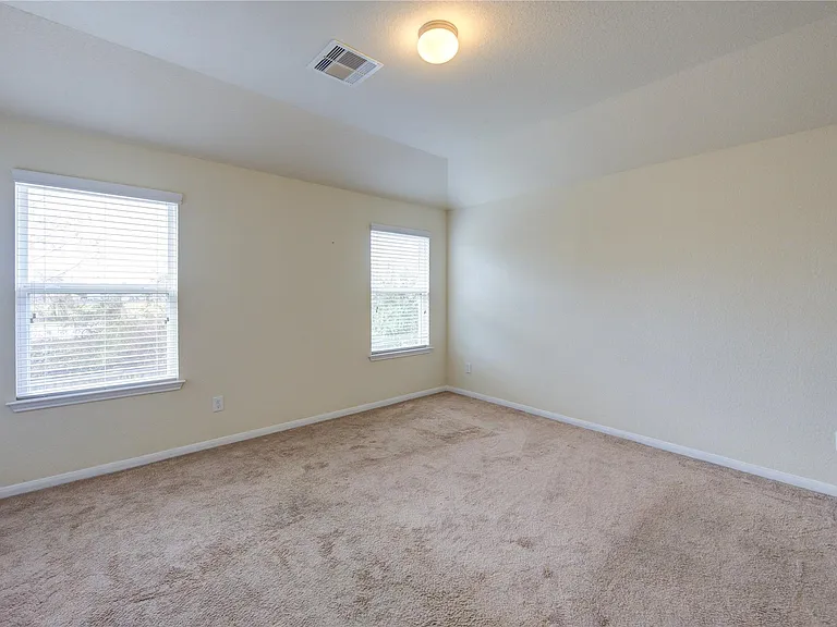 10907 Woodland Leaf Ln — Photo 22