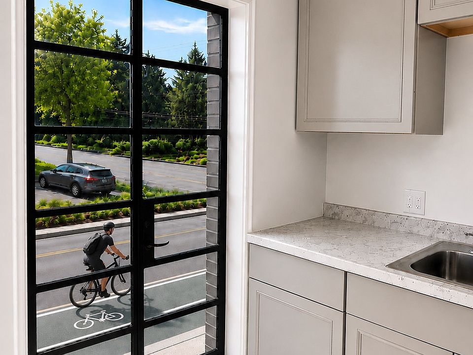New kitchen and cute balcony with french doors. Indianola Ave has dedicated bicycle lanes.