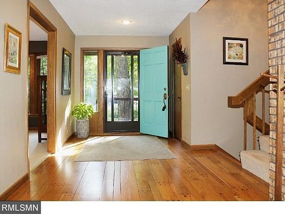 Unusually large foyer with oak pegged wood floors