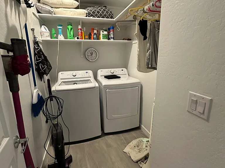 Full-size washer and dryer in the main area home