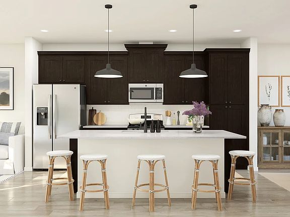 Kitchen with center island and pendant lighting - Artist Rendering