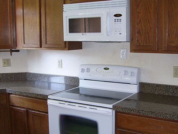 New granite countertops, glasstop range/oven and built in M/W