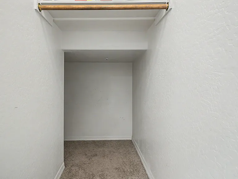 Closet space next to stairway.