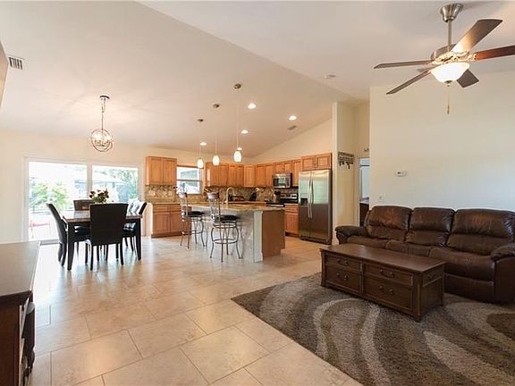 Entry and living room with 20 x 20 brick stack tile.