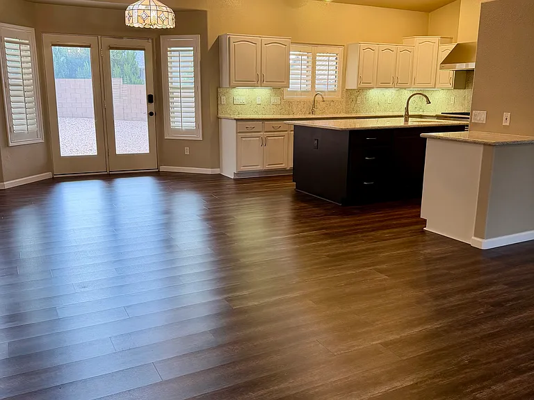 Large open concept living space - large kitchen with lots of storage, island, and pantry
