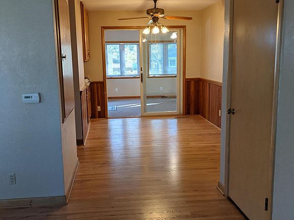 Living room looking into Dining Room and beyond into 4 Seasons Room