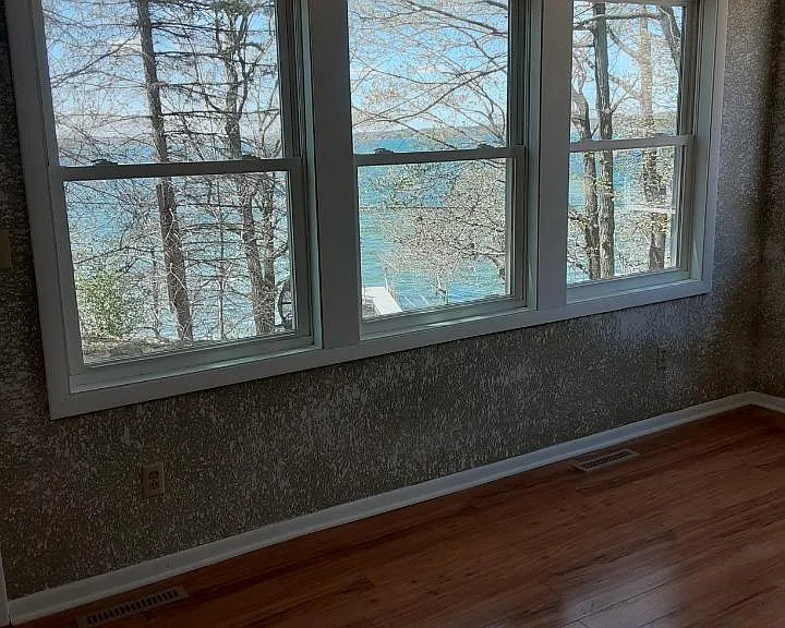 Front bedroom over looking lake with walkout patio