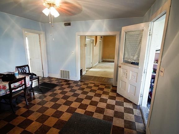 Dining room viewed from stairway to 2nd floor, looking into living room.