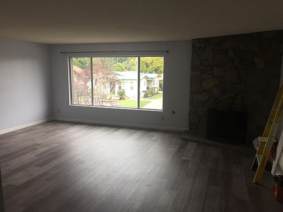 Huge living room and fireplace .