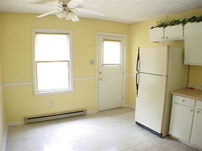 kitchen , side door to driveway and dining area