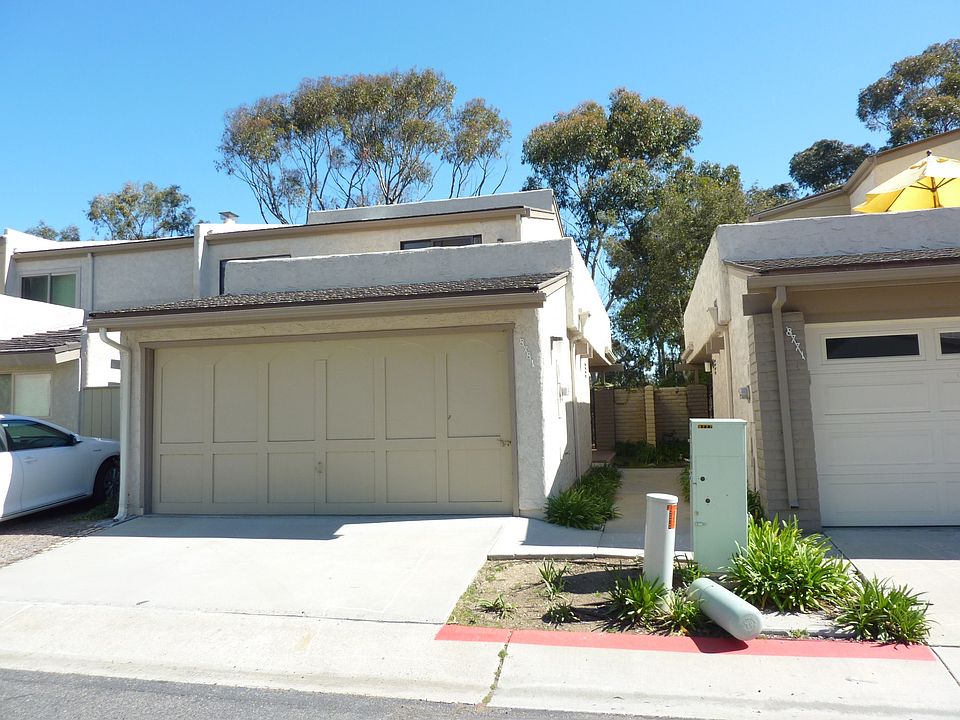 Exterior Front with Two Car Garage plus one parking space