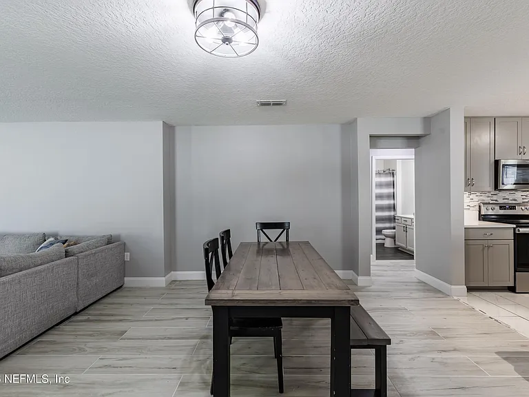 7705 Peace Ln — Photo 9
