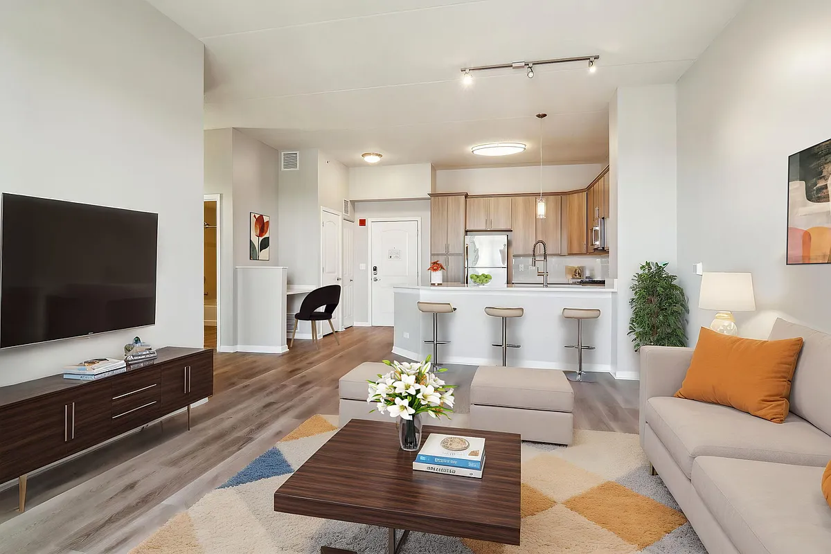 Open-concept living with breakfast bar seating - The Easton Downers Grove
