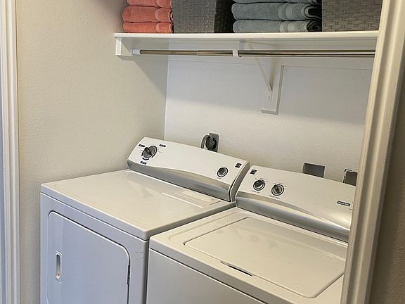 Washer and dryer in unit.