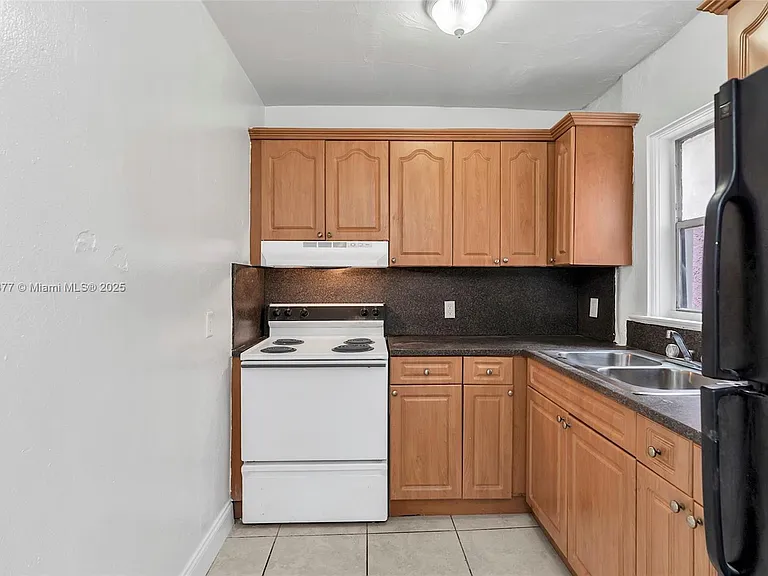 1137 NW 29th Ter #1130 — Photo 11