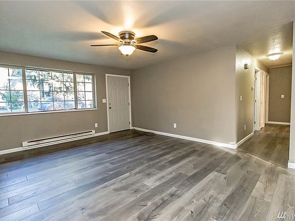 The floors have never been "lived on," and are in perfect condition.  The windows were all replaced with vinyl windows in 2013.