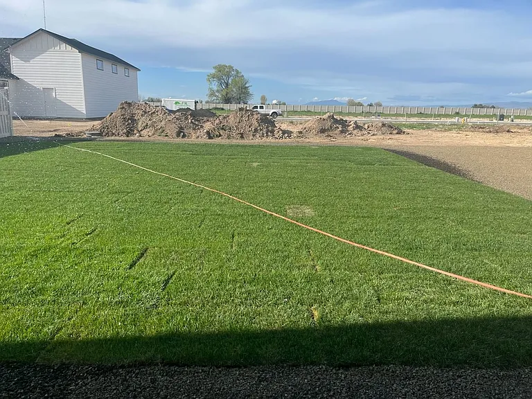 Yard is fenced and there is a home in the back now.
