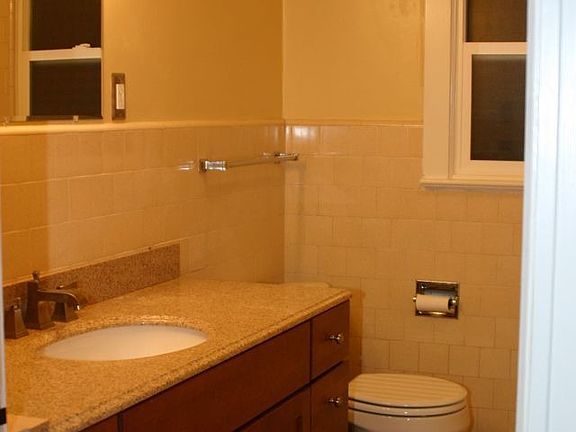 Bath - granite top, new tile flrs