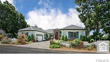 Front entrance with two separate two car garages