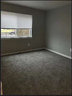 Experience comfort in this cozy bedroom, complete with modern amenities and ample natural light.