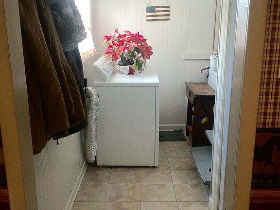 Laundry leads to upstairs 