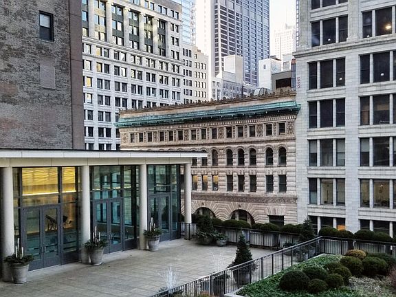 This is the view from the unit - overlooking the terrace, swimming pool and a slice of the Chicago skyline.