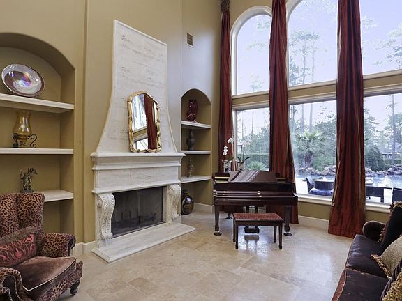 Formal Living Area with gorgeous views of backyard oasis