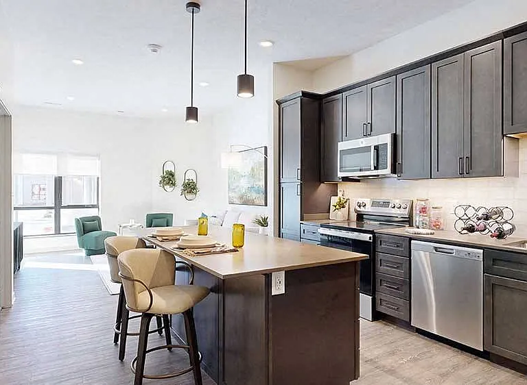 Enjoy spacious kitchens with modern cabinetry, stainless steel appliances, and a convenient islands for dining and entertaining.