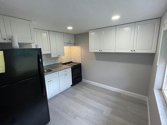 Fully renovated kitchen. Granite counter tops, SS Sink, lot of storage!