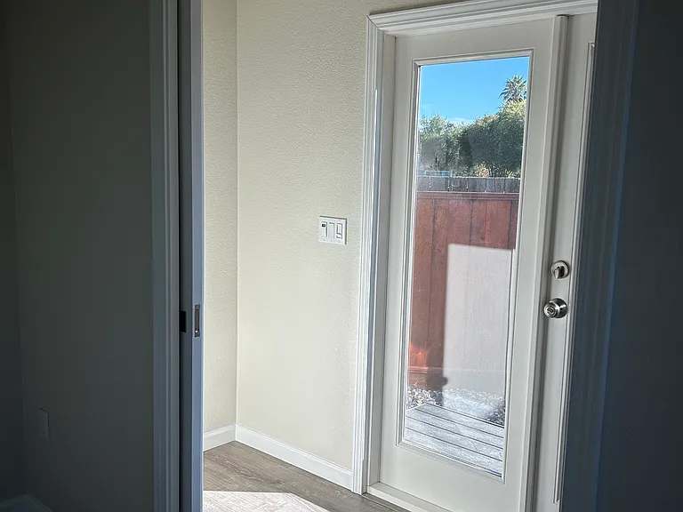 Bedroom 1 with office nook and French doors