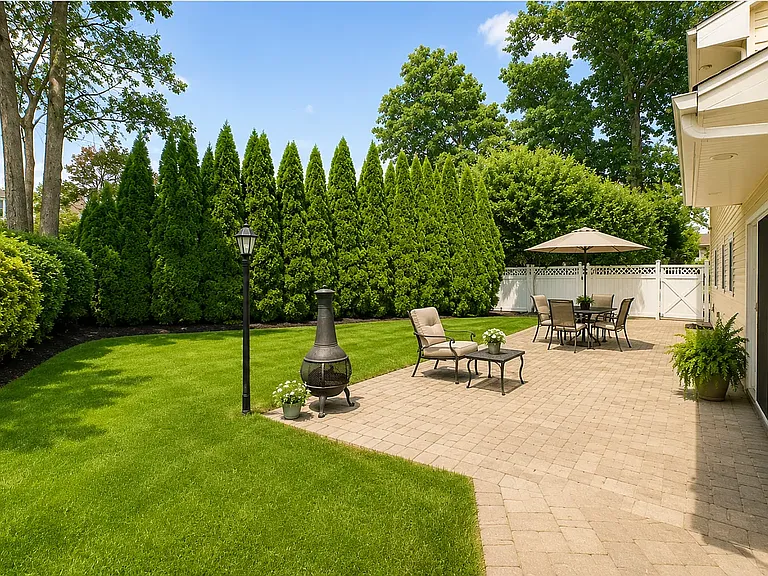 Backyard surrounded by greenery