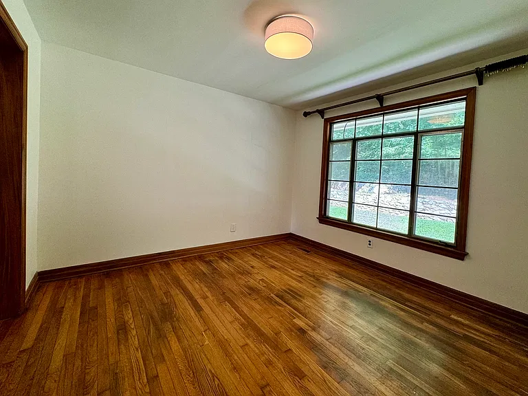 Dining Room with hardwood flooring.