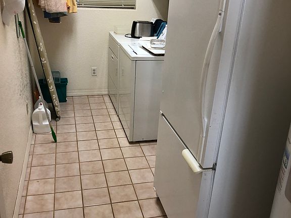Laundry Room w/ extra refrig