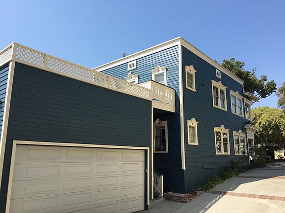Shared garage. Unit has second entrance through kitchen.
