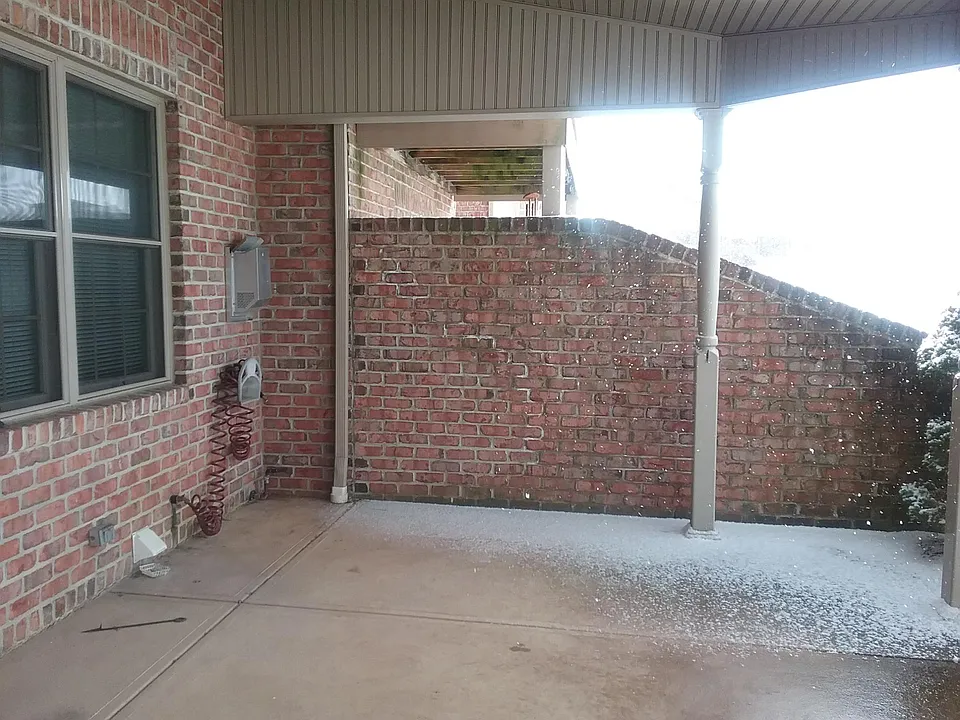 Covered back patio with ceiling fan