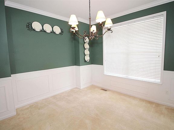 Dining Room with bump out for hutch and lovely wood accents.