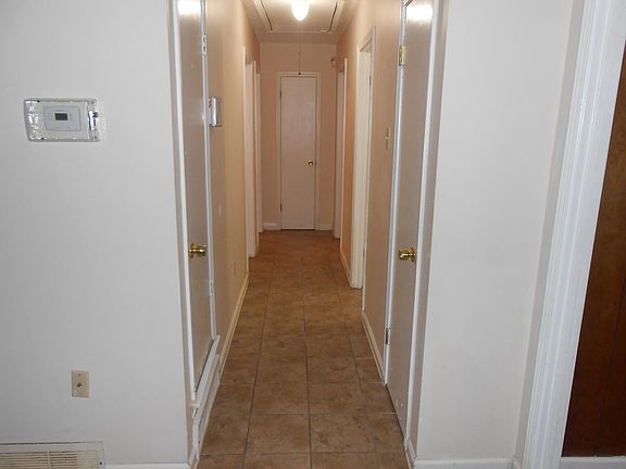 Hallway to bedrooms and bath.